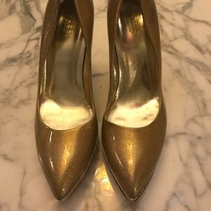 Gold Gucci shoes